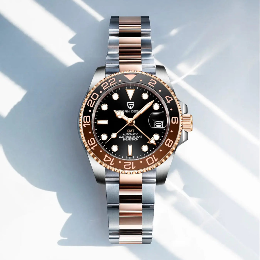 Luxury watch with black dial and rose gold accents on a light background